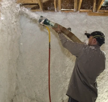 Spray Foam Kings completing a blown in insulation job in the west end toronto